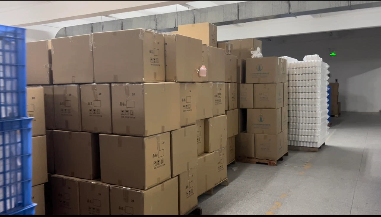 Cartons and packed bottle trays in storage